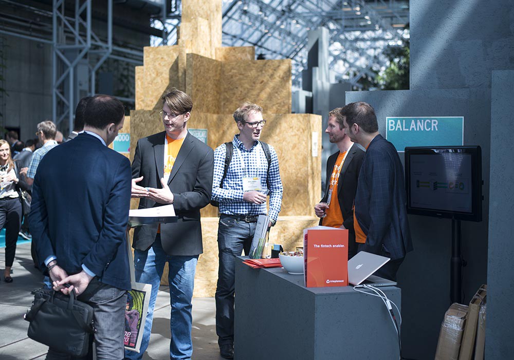 The balancr team speaking with customers at the Money20/20 Europe conference in 2017.